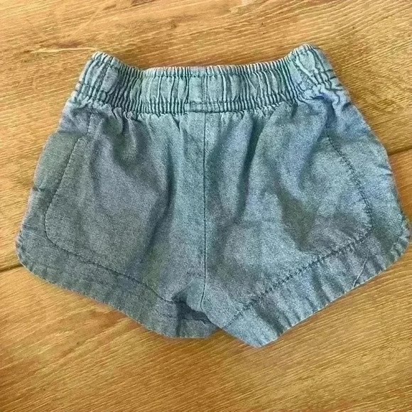 5/$10-Carters Baby Girl Blue Jean Paperbag Shorts Size 9 Months - Picture 2 of 3